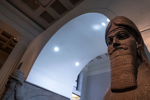 Statue, winged lion with human head, flanking the entrance to the throne room of the north-western