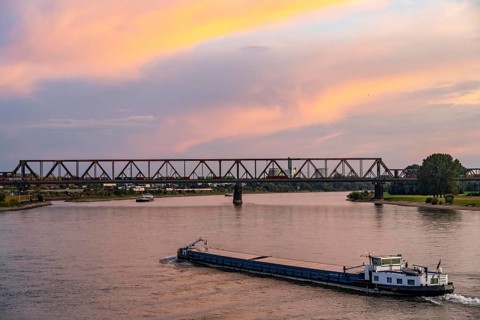 The railway bridge Duisburg-Hochfeld-Rheinhausen, over the Rhine, regional trains and many goods