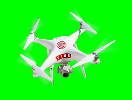 Fire department UAV unmanned aircraft system quadcopter drone flying over A green screen