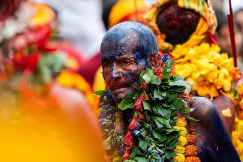 GUWAHATI, INDIA, AUGUST 19: Priests dance in the beat of Dhol (Drum) during the annual