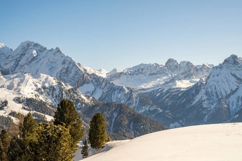 Beautiful landscape of the Mountain silhouettes of the Sexten Dolomites on a sunny winter day,