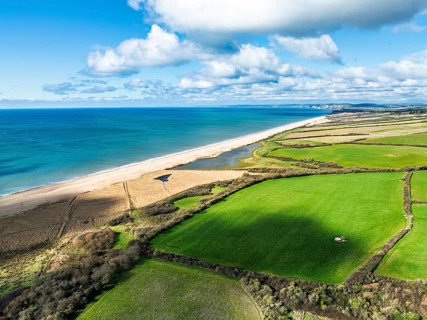 Farms over Swyre and West Bexington from a drone, West Bexington Nature Reserve, S W Coast Path,