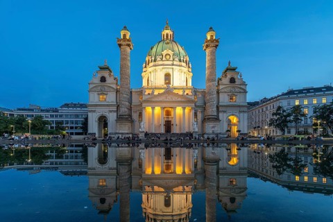 The baroque Karlskirche church at dusk, Vienna, Austria, Europe