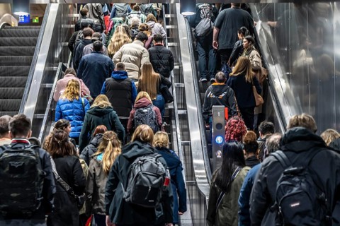 Public transport, underground, main station exit, many people crowding out of the underground