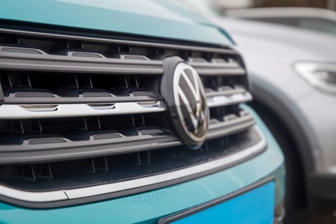 Close-up of vehicles from the car manufacturer VW in a car dealership