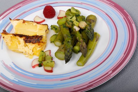 South German cuisine, green asparagus with rhubarb vinaigrette and potato gratin, healthy,