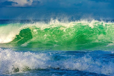 Wave on Ipanema beach illuminated by the afternoon sun Rio de Janeiro, RJ, Brazil, South America