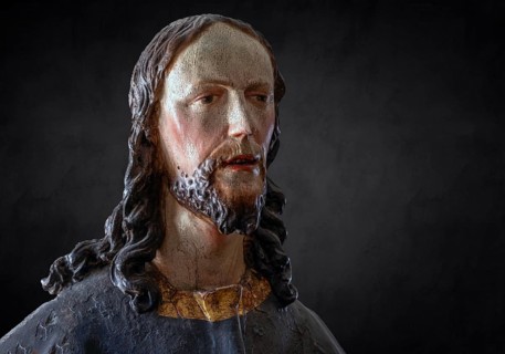 Palmesel wooden figure around 1880, Christ detail, on dark background, Dominican convent