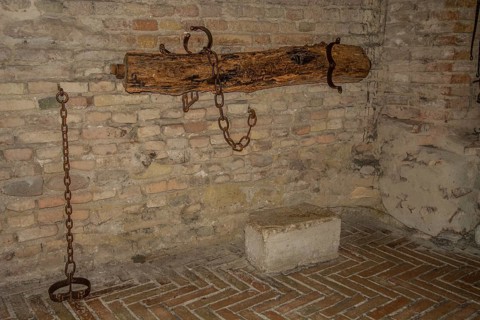 Prison cell in the basement of the medieval Gradara castle, Marche region, Italy, Europe