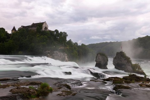 Majestic waterfall with castle in the background, Schloss Laufen, Rhine Falls, Canton Schaffhausen,