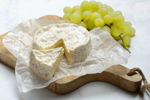 French Camembert, cheese on a wooden board
