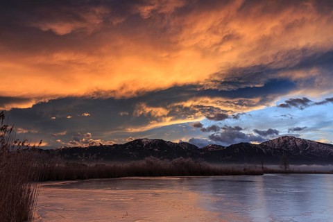 Dawn, clouds over a lake in front of mountains, winter, Riegsee, near Murnau, Bavaria, Germany,