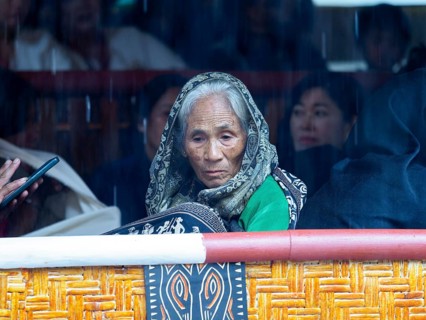Dreamy old woman, looking inwards, Tana Toraja, Sulawesi, Indonesia, Asia