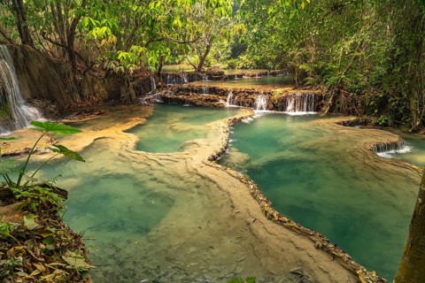 The multi-levelled Kuang Si waterfall near Luang Prabang, Laos, Asia