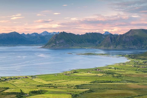 View of the coast and mountains from Mount Hoven, Gimsoy, Lofoten, Norway, Europe