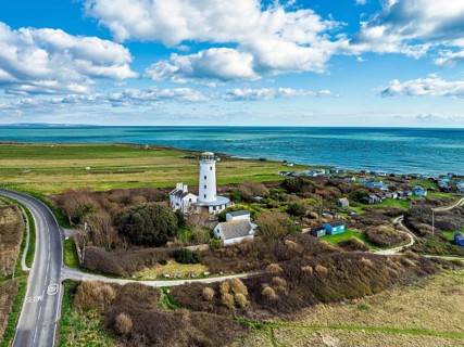 Portland Bird Observatory from a drone, Bill Lighthouse, Portland Bill, Isle of Portland, Dorset,
