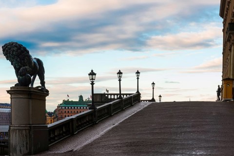 Silhouette of the royal palace in the evening sun, evening mood, guard, royal house, monarchy,