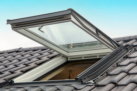 New skylight on a newly tiled roof