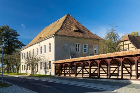 Historic market stalls on the market square in Diehsa, Waldhufen, Upper Lusatia, Saxony, Germany,