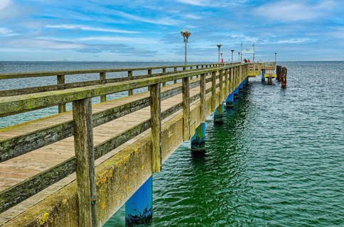 Baltic Sea beach, Baltic Sea coast with the wooden pier Graal-Müritz, Graal-Müritz,