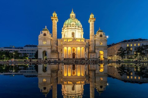 The baroque Karlskirche church at dusk, Vienna, Austria, Europe