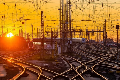 Track apron with trains, rails, points, pylons and signalling systems. Infrastructure at the main