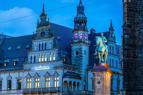 The Bismarck monument at Bremen Cathedral and the Manufactum building at dusk, Free Hanseatic City