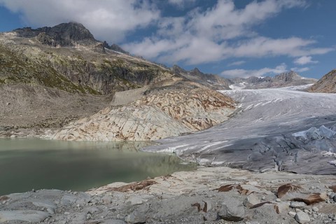 Rhone Glacier, Obergoms VS, Wallis, Switzerland. Under the white blankets is the ice grotto