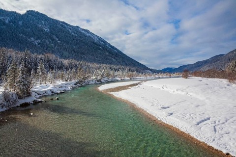 Isar valley in winter at temperatures of minus 18 degrees Celsius. Snow covered landscape with the