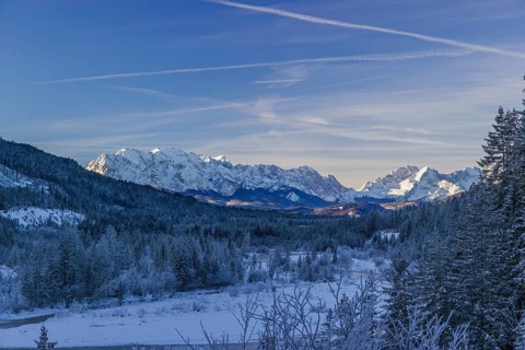 Isar valley in winter at temperatures of minus 18 degrees Celsius. Snow covered landscape with the