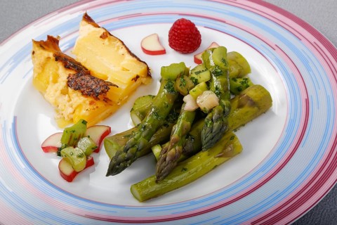 South German cuisine, green asparagus with rhubarb vinaigrette and potato gratin, healthy,