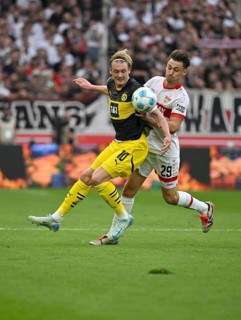 Duel, action Anthony Rouault VfB Stuttgart (29) against Julian Brandt Borussia Dortmund BVB (10)