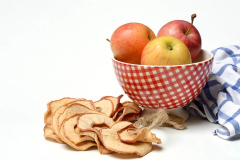 Apple rings and apples in peel, dried fruit