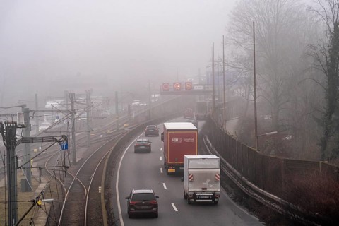 Dense fog, with visibility sometimes less than 100 metres, A40 motorway, city passage in Essen,