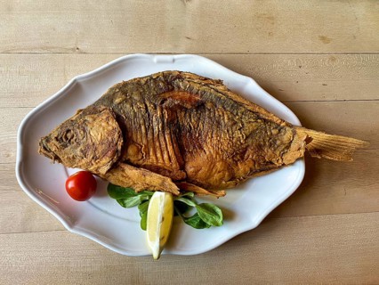 Baked carp on a plate, Franconian speciality, Nuremberg, Franconia, Bavaria, Germany, Europe