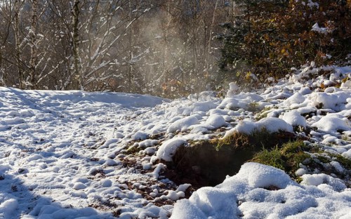 Visible heat emission due to smouldering fires in the overburden, spoil heap from the former