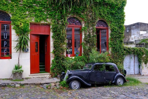 Colonia del Sacramento, Colonia, Uruguay, vintage cars parked in the alleyways of the old town.