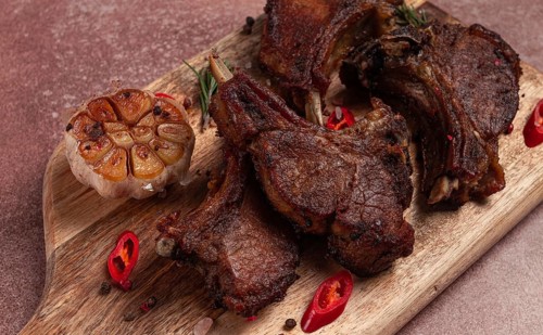 Fried veal ribs, with spices, baked in the oven, homemade, no people