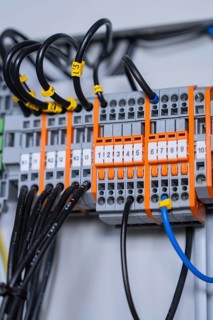 Detailed view of individual circuit-breakers in a larger electrical system, professional technology