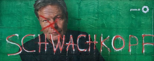 Denigration of a large poster for the 2025 federal election by the Greens with Robert Habeck,