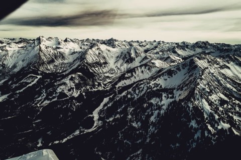 Flight over the late winter Lech Valley with a small aeroplane in Tyrol, Austria, Europe