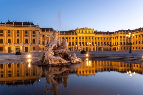 Fountain in the courtyard of honour at Schönbrunn Palace at dusk, UNESCO World Heritage Site in