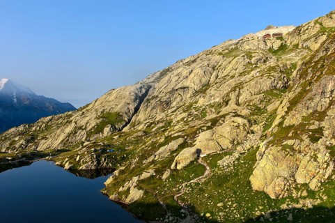 Sloping rocky area in the Aiguilles Rouges nature reserve between the mountain lake Lacs des