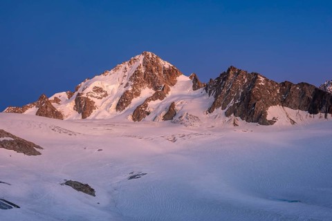High alpine mountain landscape at sunset, Glacier du Tour, glacier and mountain peak, summit of the