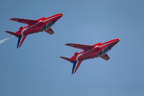 BAE Systems Hawk two aircraft of the RAF Royal air force Red Arrows display team flying, England,