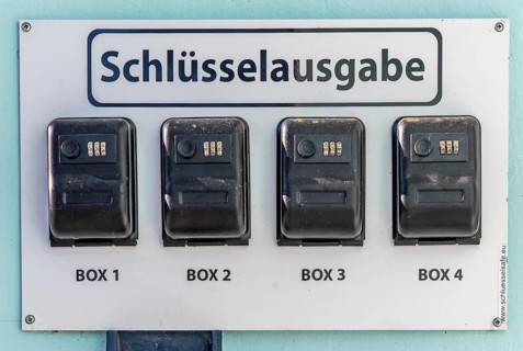 Key distribution boxes, safes, at a small hotel, guests receive a code with which they can open the