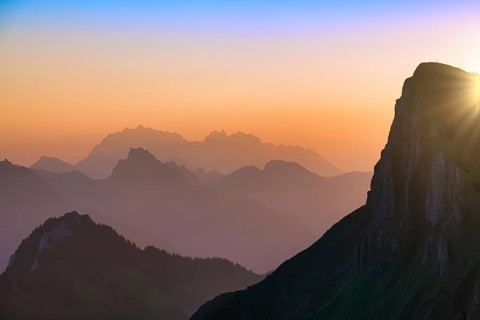 Appenzell Alps with Alpstein and Säntis at sunrise, in the foreground rock face of the Tierberg,