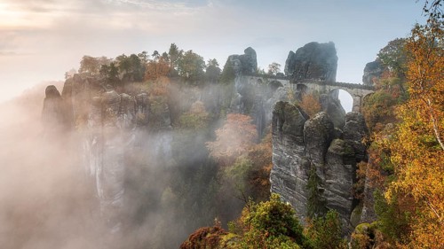 View of the Bastei Bridge with morning mist in autumn, Bastei near Rathen, Elbe Sandstone