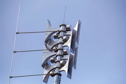 Close-up of a siren at a school
