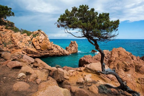 Red rocks and sea, Spiaggia di Coccorocci, near Tertenia, Province of Ogliastra, Sardinia, Italy,